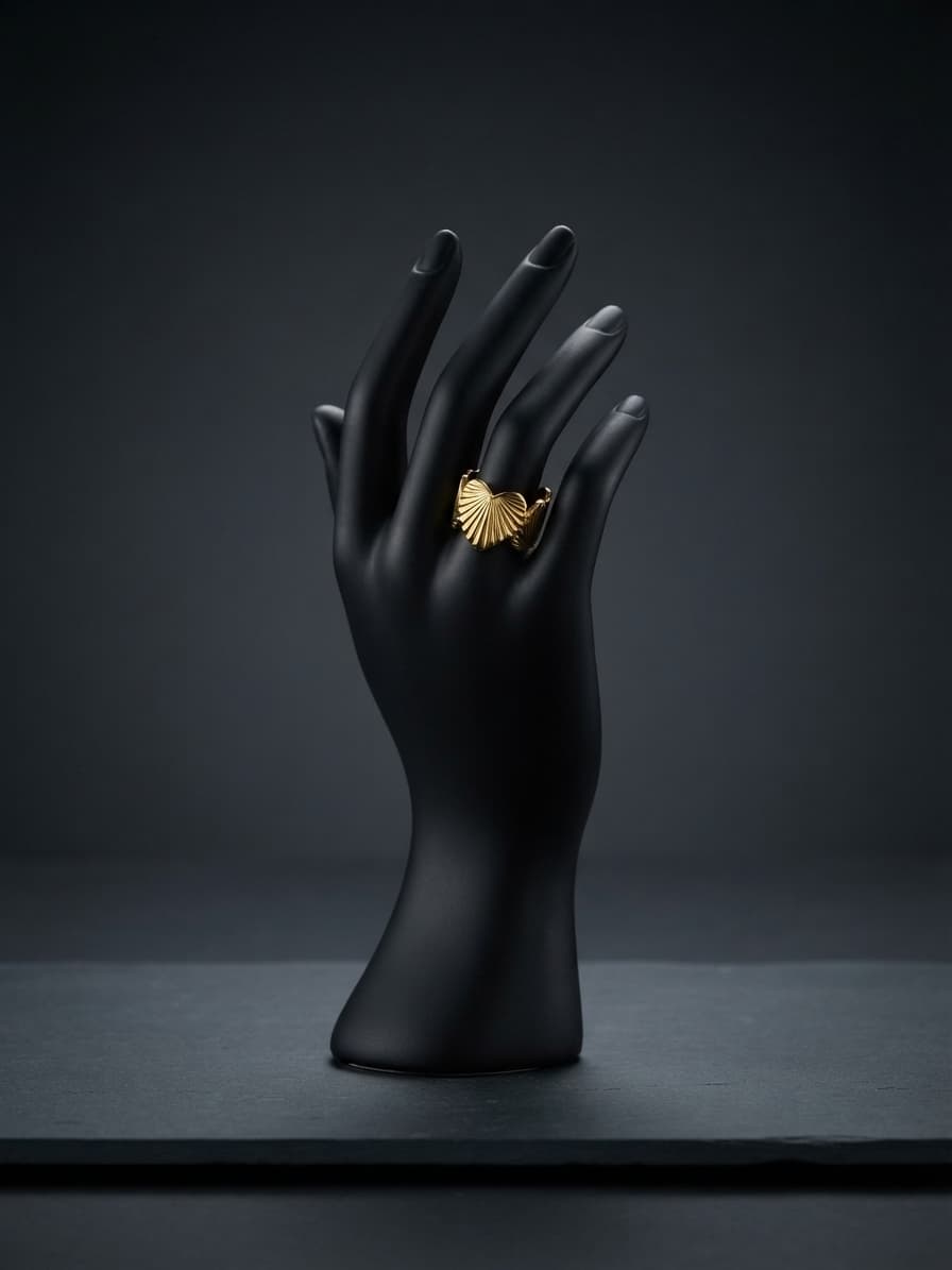 Anillo chico de acero forma de corazones pegados